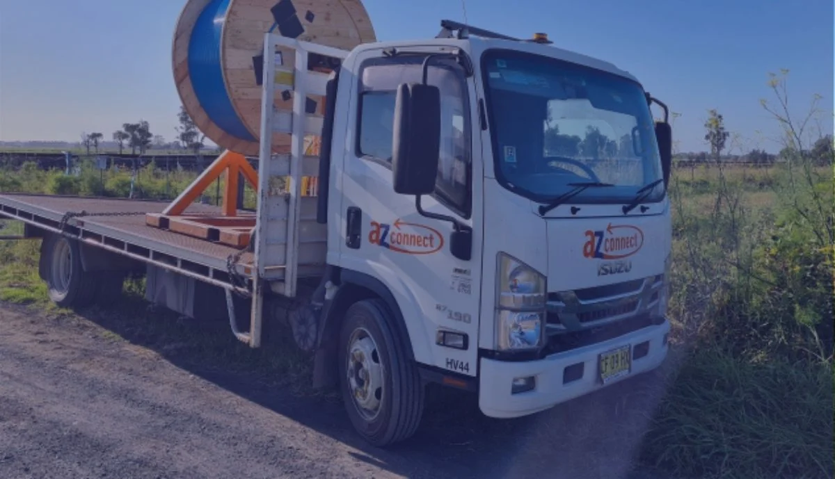 AZ Connect truck transporting a cable drum to site